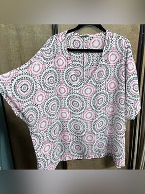 1.4.3. Story by Line Up Pink and White Geo Printed V-Neck Blouse